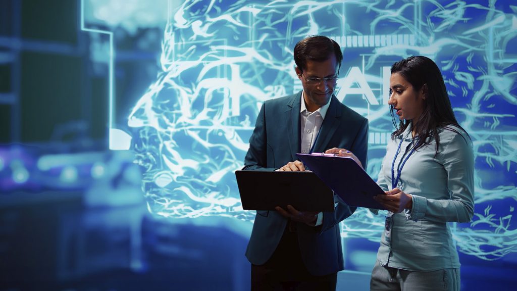 máster en IA con dos personas estudiando